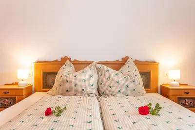 Ein Bett oder Betten in einem Zimmer der Unterkunft Ferienhaus Mittersill am Biohof Widholz