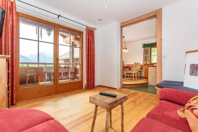 Ein Sitzbereich in der Unterkunft Ferienhaus Mittersill am Biohof Widholz