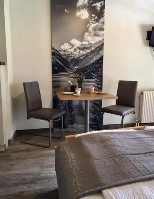 Ein Sitzbereich in der Unterkunft Landhaus Rosengartl Krimml