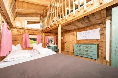 Ein Bett oder Betten in einem Zimmer der Unterkunft Superior Chalet Brandleit