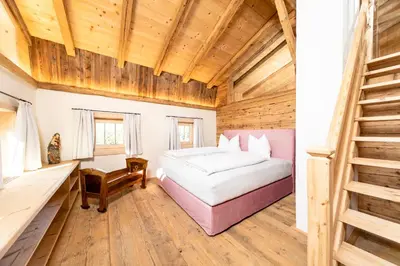 Ein Bett oder Betten in einem Zimmer der Unterkunft Superior Chalet Brandleit