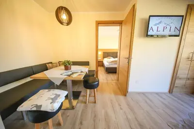 Ein Sitzbereich in der Unterkunft Residence Alpin
