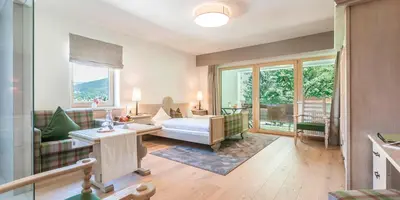 Ein Bett oder Betten in einem Zimmer der Unterkunft Hotel B&B 