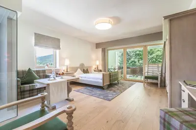Ein Bett oder Betten in einem Zimmer der Unterkunft Hotel B&B 