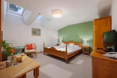 Ein Bett oder Betten in einem Zimmer der Unterkunft Hotel B&B 