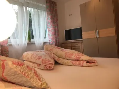 Ein Bett oder Betten in einem Zimmer der Unterkunft Ferienwohnung Julia