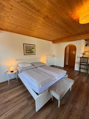 Ein Bett oder Betten in einem Zimmer der Unterkunft City-apart Kitzbühel Stadt