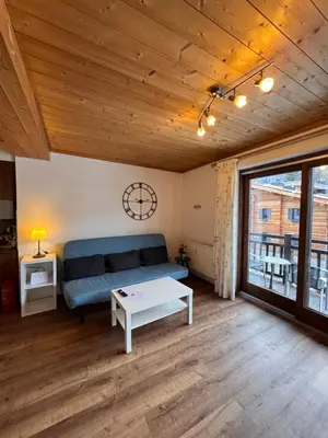 Ein Bett oder Betten in einem Zimmer der Unterkunft City-apart Kitzbühel Stadt