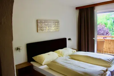 Ein Bett oder Betten in einem Zimmer der Unterkunft Ferienhaus Penz