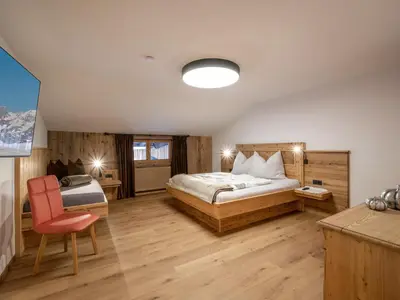 Ein Bett oder Betten in einem Zimmer der Unterkunft Bauernhof Vordermühltal