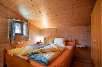 Ein Bett oder Betten in einem Zimmer der Unterkunft Landhaus Huber