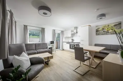 Ein Sitzbereich in der Unterkunft Kaiserwinkl Apartments Daxer