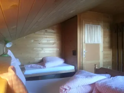 Ein Bett oder Betten in einem Zimmer der Unterkunft Ferienhütte Rist