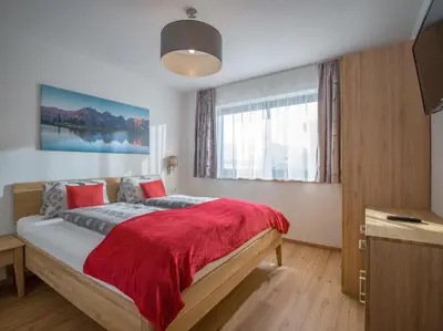 Ein Bett oder Betten in einem Zimmer der Unterkunft Appartement Strasser