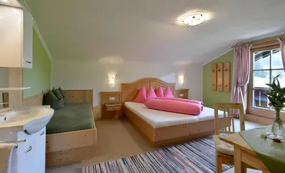 Ein Bett oder Betten in einem Zimmer der Unterkunft Hof Obertann