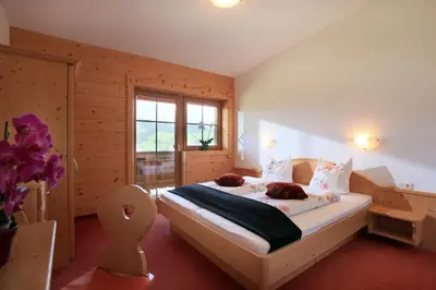Ein Bett oder Betten in einem Zimmer der Unterkunft Gasthaus Obergaisberg