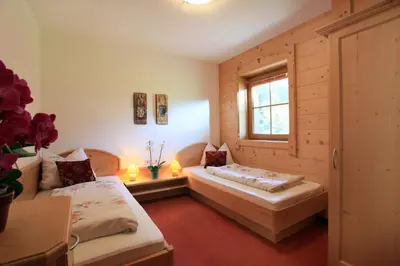 Ein Bett oder Betten in einem Zimmer der Unterkunft Gasthaus Obergaisberg