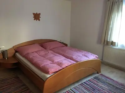 Ein Bett oder Betten in einem Zimmer der Unterkunft Apartment Julia & Maria