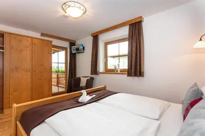 Ein Bett oder Betten in einem Zimmer der Unterkunft Landhaus Bergblick