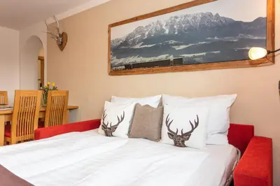 Ein Bett oder Betten in einem Zimmer der Unterkunft Landhaus Bergblick