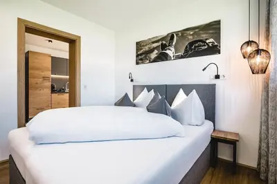 Ein Bett oder Betten in einem Zimmer der Unterkunft Cabin8 Alpine Flair Apartments