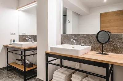 Ein Badezimmer in der Unterkunft Cabin8 Alpine Flair Apartments