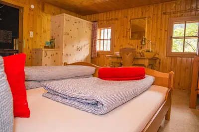 Ein Bett oder Betten in einem Zimmer der Unterkunft Tradlhof