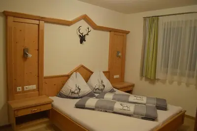 Ein Bett oder Betten in einem Zimmer der Unterkunft Ferienwohnung Lechner Daniel