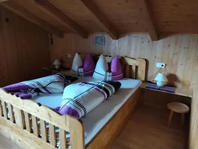 Ein Bett oder Betten in einem Zimmer der Unterkunft Ferienwohnung Spitaler Unterkofler