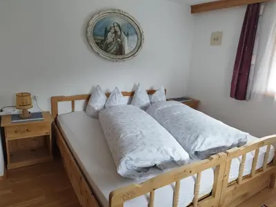 Ein Bett oder Betten in einem Zimmer der Unterkunft Ferienwohnung Spitaler Unterkofler