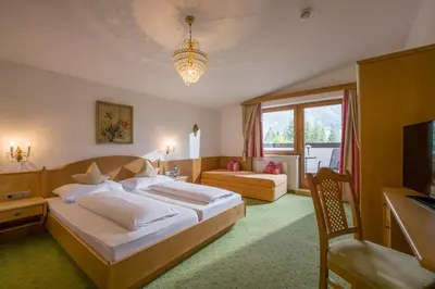 Ein Bett oder Betten in einem Zimmer der Unterkunft Hotel Pension Wiesenhof