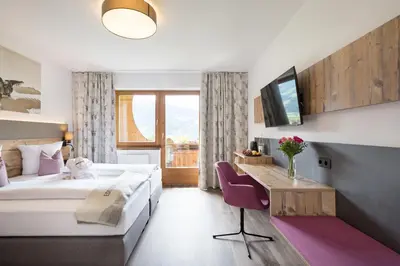 Ein Bett oder Betten in einem Zimmer der Unterkunft Hotel Pension Wiesenhof