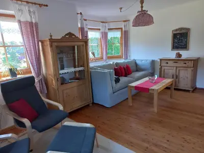 Ein Sitzbereich in der Unterkunft Chalet Glücklich sein...
