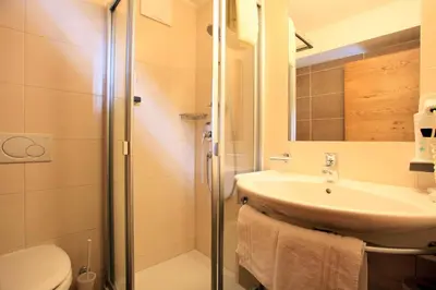Ein Badezimmer in der Unterkunft Appartements Kirchenwirt