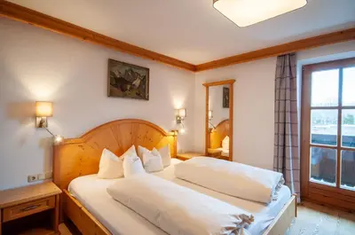 Ein Bett oder Betten in einem Zimmer der Unterkunft Appartements Kirchenwirt