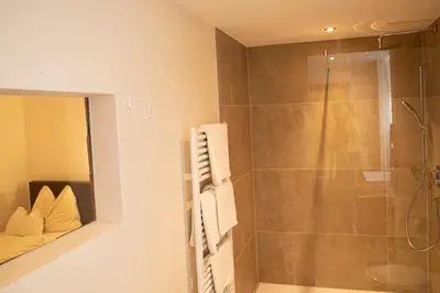 Ein Badezimmer in der Unterkunft Appartements Kirchenwirt