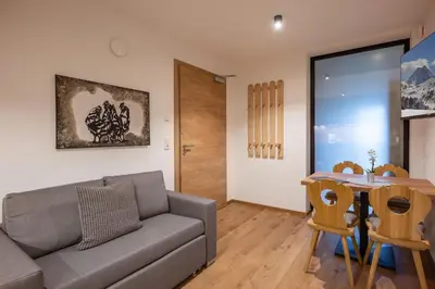 Ein Sitzbereich in der Unterkunft Mannharthof Apartments