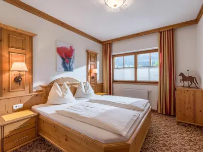 Ein Bett oder Betten in einem Zimmer der Unterkunft Appartements Haflingerhof