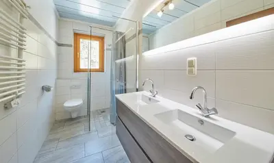 Ein Badezimmer in der Unterkunft Appartement Bernkogel