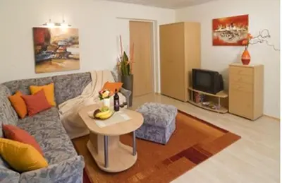 Ein Sitzbereich in der Unterkunft Apartment Landhaus Krall