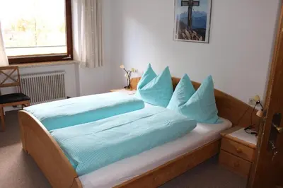 Ein Bett oder Betten in einem Zimmer der Unterkunft Lamplhof B&B