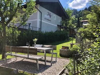 Ein Garten an der Unterkunft MyApart Jochberg