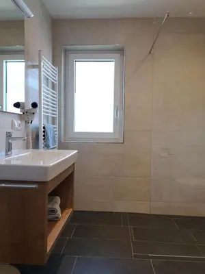 Ein Badezimmer in der Unterkunft Gästehaus Braunegger