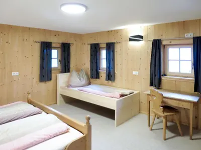 Ein Bett oder Betten in einem Zimmer der Unterkunft Chalet Alm Chalet by Interhome