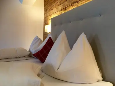 Ein Bett oder Betten in einem Zimmer der Unterkunft Gasthof Herrnhaus