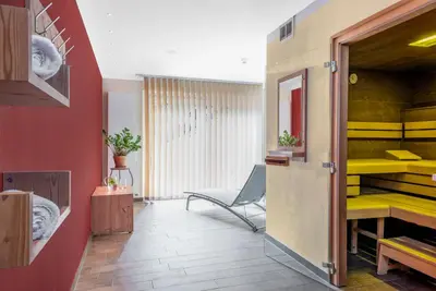 Ein Bett oder Betten in einem Zimmer der Unterkunft Hapimag Saalbach