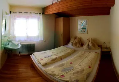 Ein Bett oder Betten in einem Zimmer der Unterkunft Haus Salzachblick