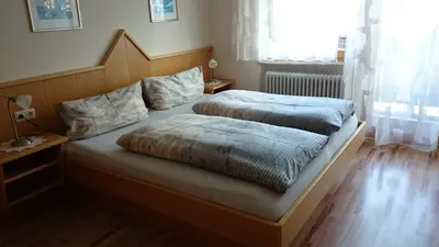 Ein Bett oder Betten in einem Zimmer der Unterkunft Haus Salzachblick