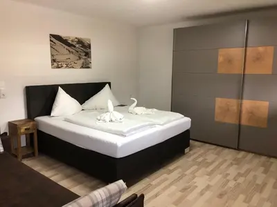 Ein Bett oder Betten in einem Zimmer der Unterkunft Haus Willibald