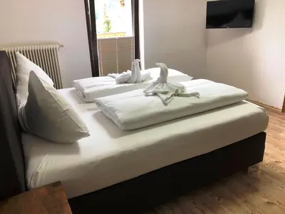 Ein Bett oder Betten in einem Zimmer der Unterkunft Haus Willibald